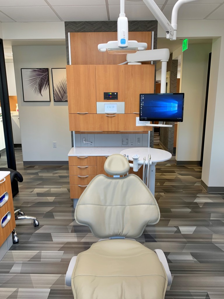 Inside of treatment room with chair and equipment