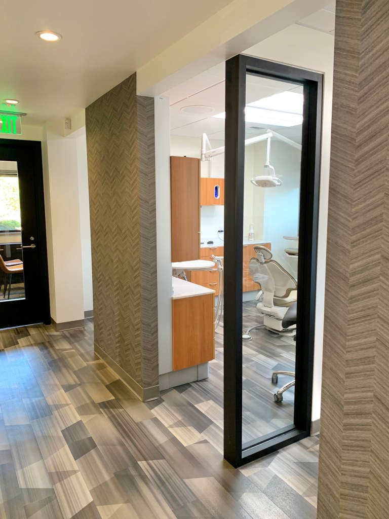 View of hallway and open treating room